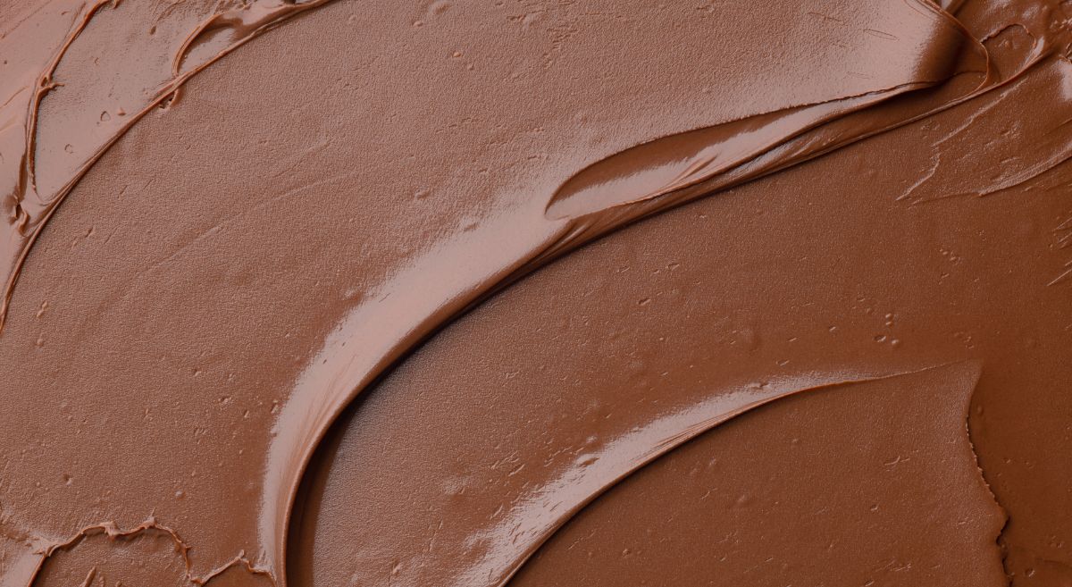 A closeup of dull, untempered chocolate.